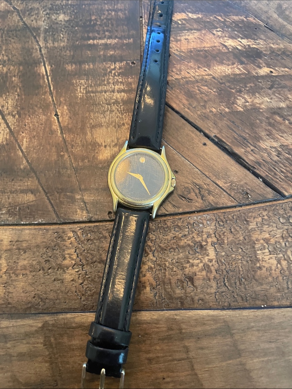 Movado Black Leather Strap Watch with Gold-Tone Case